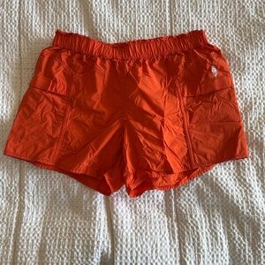 FP Movement by Free People Bright Orange Athletic Shorts